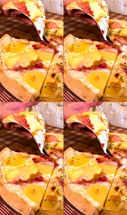 Pizza artisanale avec tranches d'ananas et jambon, prête à être dégustée chez Basilic & Co Cambrai.