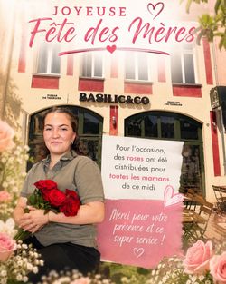 Façade du restaurant Basilic & Co à Cambrai avec une affiche pour la fête des mères et bouquets de roses distribués.